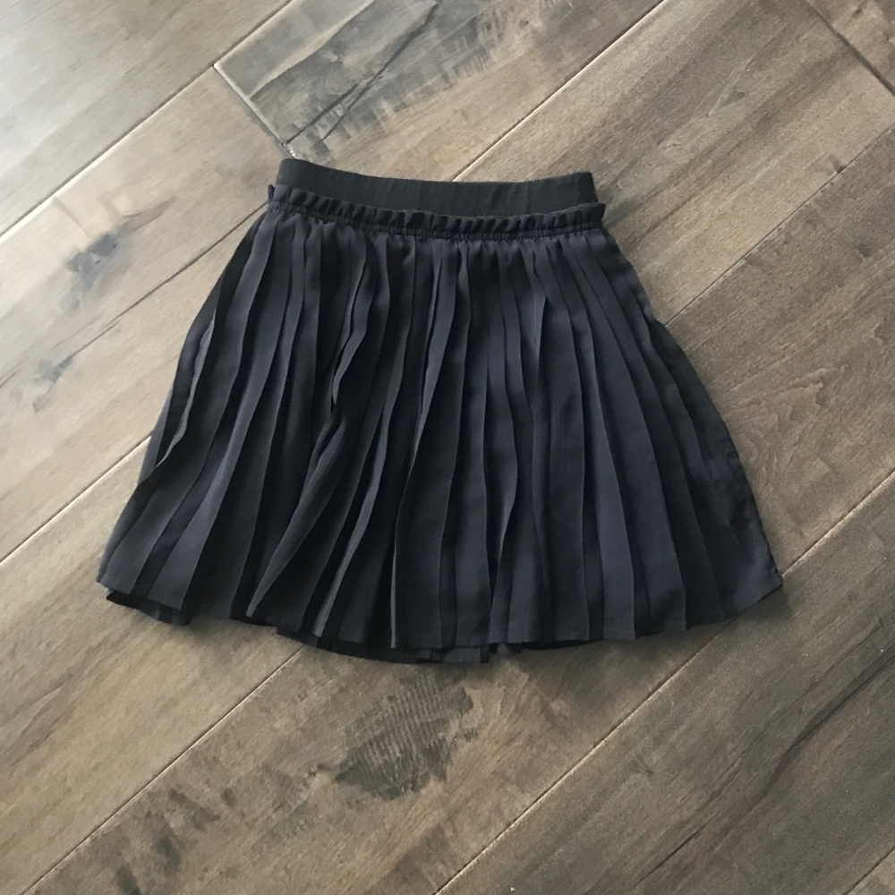 Girls black pleated skirt
